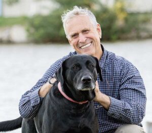 Photo of Ron Hines and dog